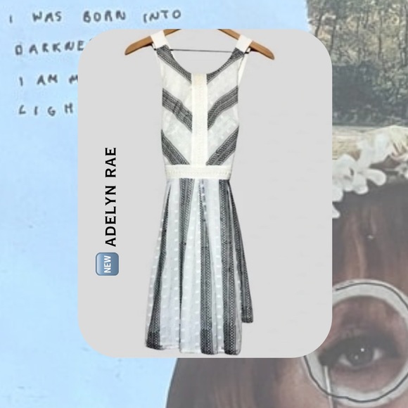 Adelyn Rae Dresses & Skirts - 🏷️ adelyn rae white polka dot dress with black embroidery & criss cross back